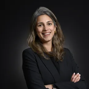 headshot of woman in dark jacket