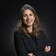 headshot of woman in dark jacket