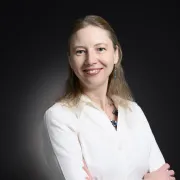 headshot of woman in white shirt 
