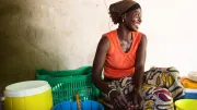 A Senegalese woman at her market stand