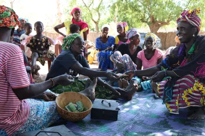 Women gather in their savings group