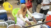 A woman works a market stall
