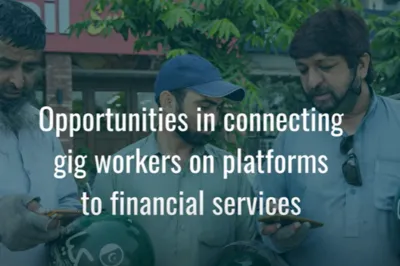 platform workers looking at their phones