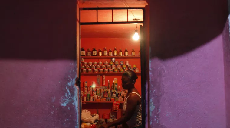 a rural woman in a dimly lit store