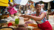 A woman vendor at her market stall