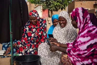 Women prepay digitally for water